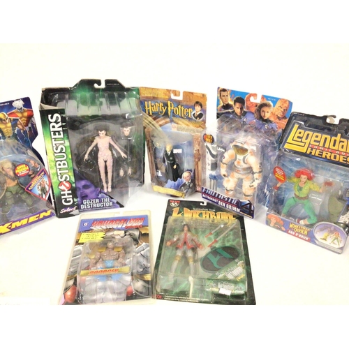 63 - A Collection of Assorted Action Figures including Ghostbusters. Harry Potter. X-Men and Others.