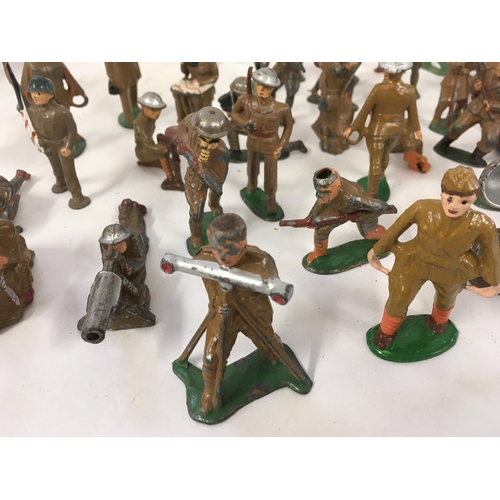 66 - A collection in excess of 40 model figures mainly soldiers No manufacturers marks other than some st... 