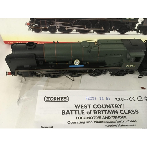 67 - A boxed Hornby model locomotive with tender R2221. West Country Battle of Britain Class. 17 Squadron... 