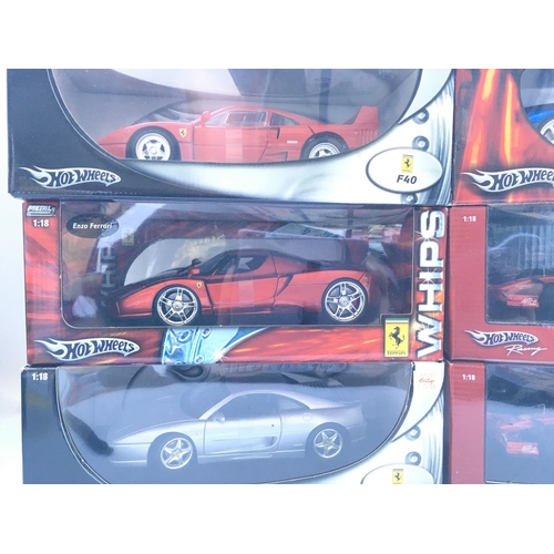 671 - A Collection of Boxed Hot Wheels Model Ferraris 1:18 Scale.