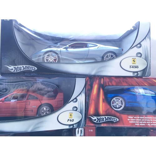 671 - A Collection of Boxed Hot Wheels Model Ferraris 1:18 Scale.