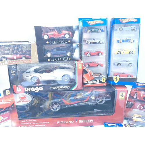 672 - A Collection of Boxed Hot Wheels. Burago. Shell Ferraris.