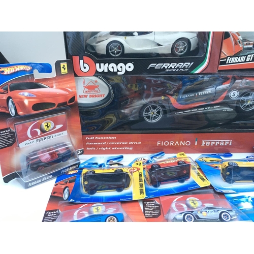 672 - A Collection of Boxed Hot Wheels. Burago. Shell Ferraris.