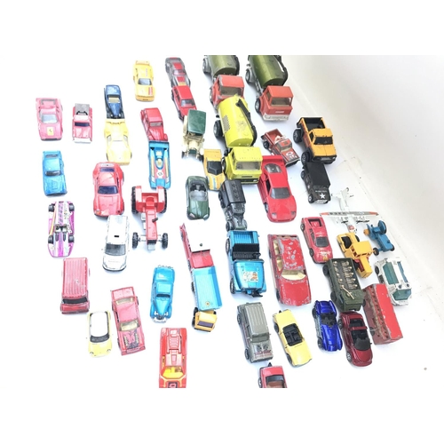 685 - A Collection of Various playworn Diecast Vehicles including Dinky. Matchbox. Ertl. Corgi.