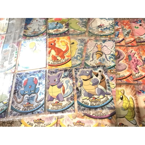 695 - A Binder containing Topps Pokemon Cards. No Reserve.