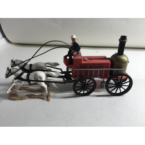 700 - A collection of five Timpo Western horse and wagons. Includes fire wagon..Wells Fargo wagon..Chuck W... 