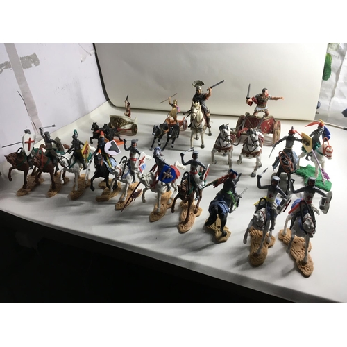 701 - Collection of plastic models by Britains. Cherilea and others. Includes 13 mounted knights. A mounte... 