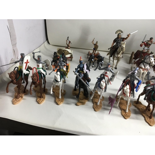 701 - Collection of plastic models by Britains. Cherilea and others. Includes 13 mounted knights. A mounte... 