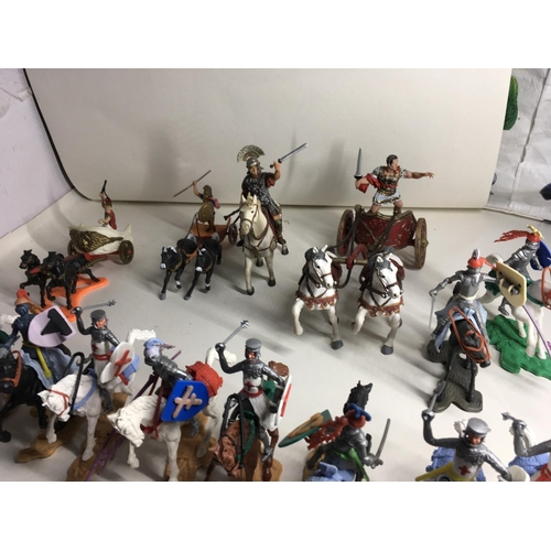 701 - Collection of plastic models by Britains. Cherilea and others. Includes 13 mounted knights. A mounte... 