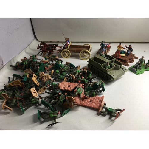 704 - A collection of Timpo plastic figures and vehicles themed in Wild West and WWII