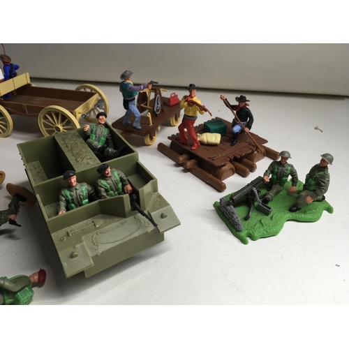 704 - A collection of Timpo plastic figures and vehicles themed in Wild West and WWII