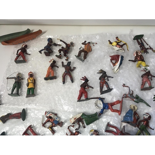 710 - A collection in excess of 70 metal figures by Britains and others. Themed as western Indians.