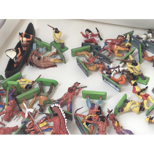 712 - A collection in excess of 60 cowboys an Indians plastic model figures by Britains Deetail