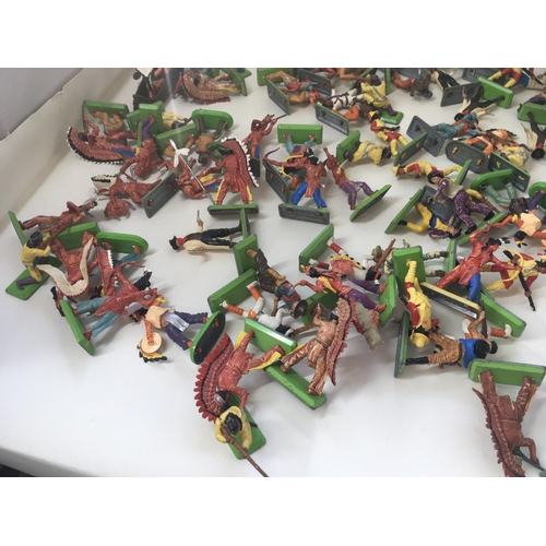 712 - A collection in excess of 60 cowboys an Indians plastic model figures by Britains Deetail