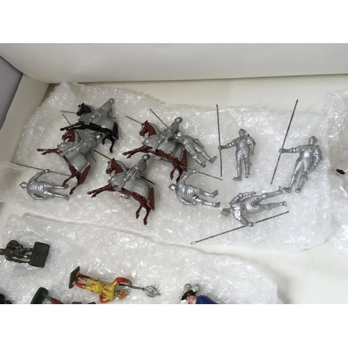 714 - A collection in excess of 60 metal toy knights by Cherilea and others. Includes horses and 6 highlan... 