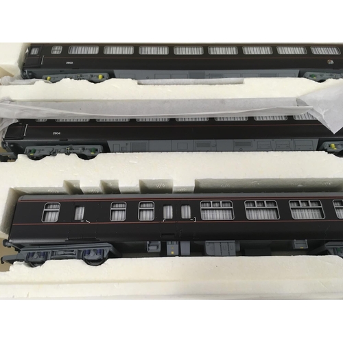 72 - A boxed Hornby set THE ROYAL TRAIN R2370 includes locomotive and tender together with three coaches.... 