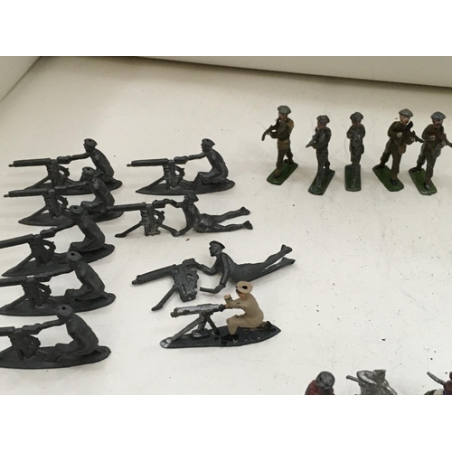 730 - A collection in excess of 45 pieces of lead figures by Hillco and unmarked. 28 soldiers includes mac... 