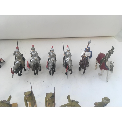 747 - A Collection of 25 metal figures by Britains and others. Includes soldiers. Mounted knights from a v... 