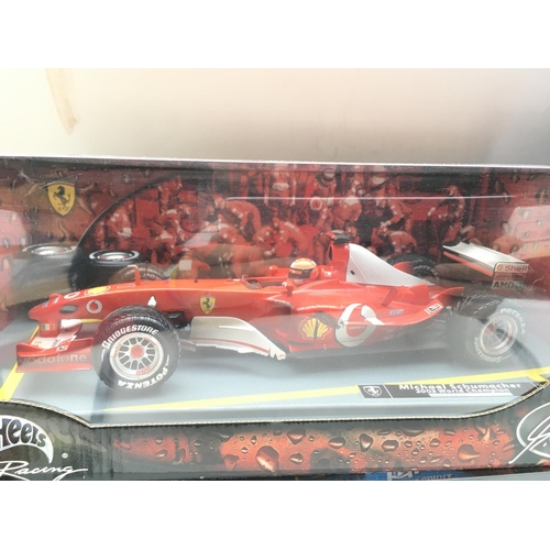 769 - 4 Boxed Diecast F1 Cars. Including Hot Wheels and Revell 1:18 Scale. (4).