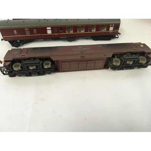 78 - An unboxed pair of locomotives Hornby Western Invader D1009 weathered edition with 2 coaches. A Lima... 