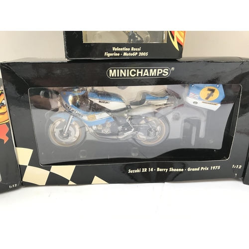 797 - A Boxed Minichamps Suzuki XR 14 (Barry Sheen) and 3 Valentino Rossi Figures.