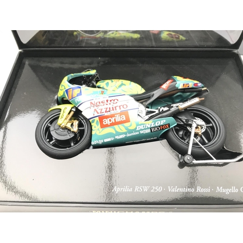 809 - 3 Boxed Minichamps. A Aprilia RSW 250CCM. A Ayrton Senna Lotus 97T and a Aprilia 125CCM.