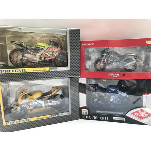 811 - A Collection of 4 Boxed Diecast Motorcycles including Protar Guiloy and Minichamps.(4).