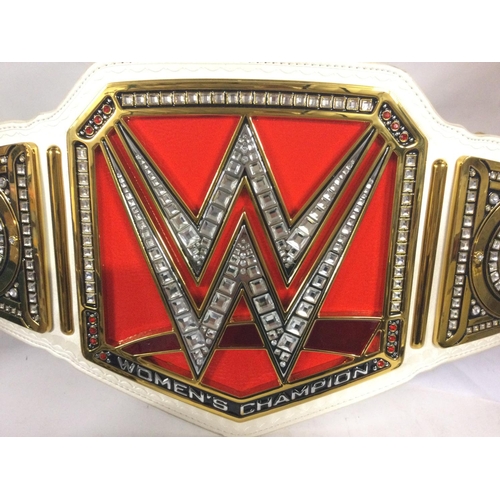 849 - A WWE Raw Womens Championship Replica Title Belt. Full size with Adjustable Fastener Strap. With Rhi... 