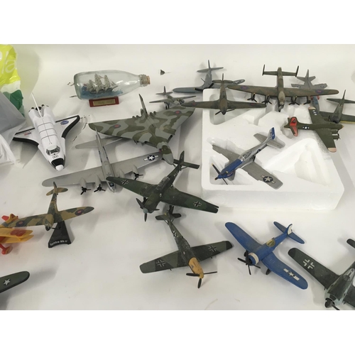 878 - A collection of diecast model aircraft mainly military plus various plastic model warships in excess... 