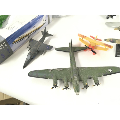 878 - A collection of diecast model aircraft mainly military plus various plastic model warships in excess... 