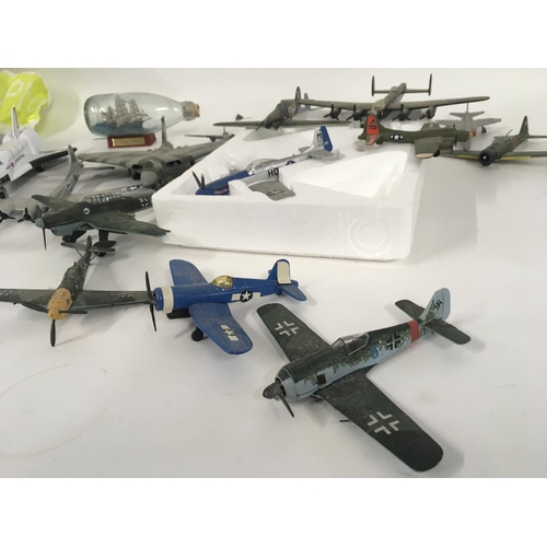 878 - A collection of diecast model aircraft mainly military plus various plastic model warships in excess... 