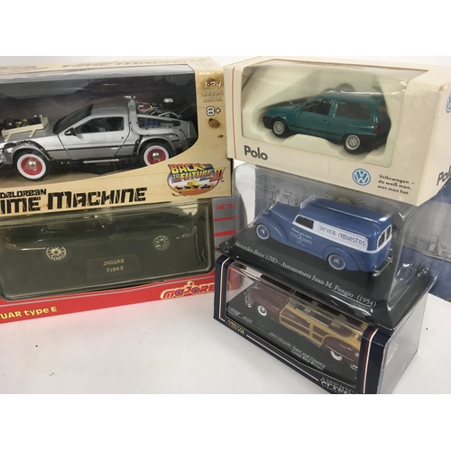 883 - A collection of 16 model vehicles by different manufacturers all in original packaging.