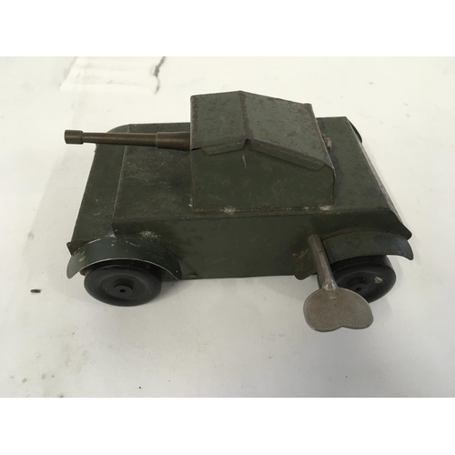 892 - Two old toys. OPERATION ATTACK in original box with tank missiles and gun. Also a tin model clockwor... 