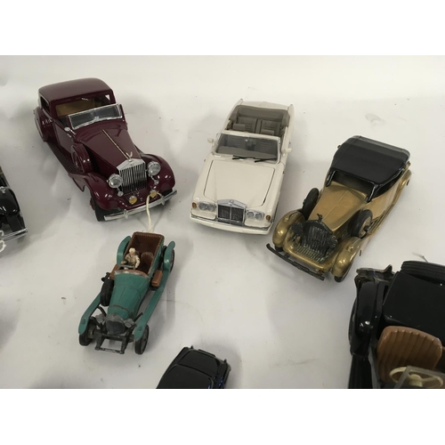 894 - A collection of 11Collectable model cars by Franklin Mint. Corgi and others