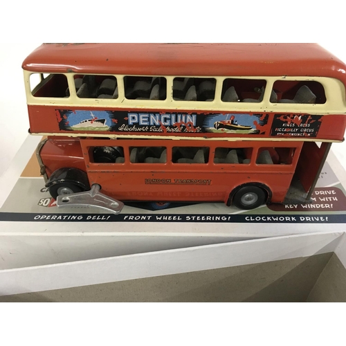 897 - A collection of four model vehicles. Includes a Minic Toys Routemaster with key