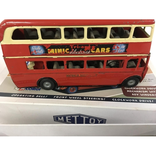 897 - A collection of four model vehicles. Includes a Minic Toys Routemaster with key