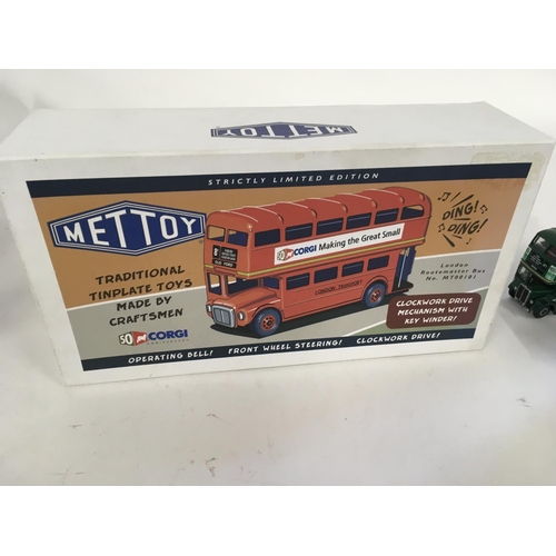 897 - A collection of four model vehicles. Includes a Minic Toys Routemaster with key