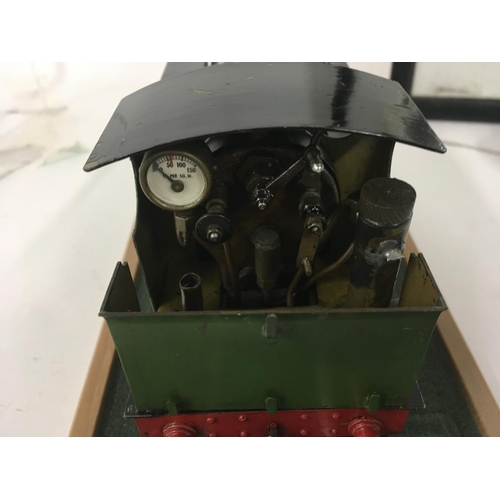 902 - A Scratch built live steam model locomotive 0 gauge in presentation case. Also mounted 00 gauge mode... 