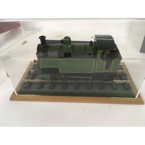 902 - A Scratch built live steam model locomotive 0 gauge in presentation case. Also mounted 00 gauge mode... 