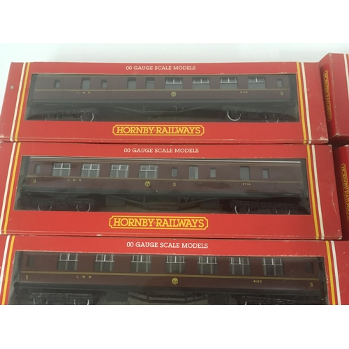 911 - A collection of 10 boxed Hornby model Railway coaches. 00 gauge.