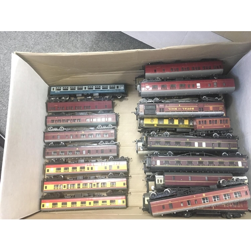 912 - A Box containing in excess of forty loose coaches all 00 gauge. Mainly Hornby..Mainline and others.