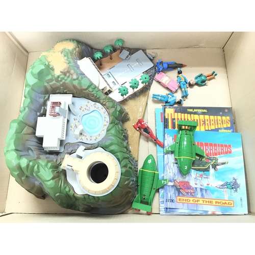 913 - A Box Containing a Thunderbirds Tracey Island with accessories. NO RESERVE