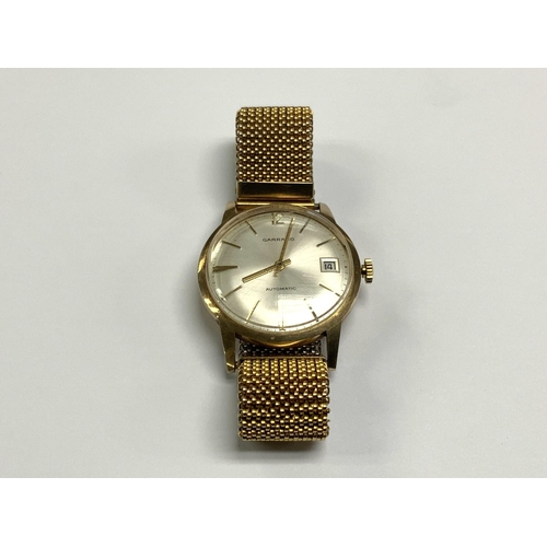 1 - A 9ct gold gents automatic Garrard wristwatch, (A)