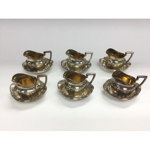 13 - A set of 6 silver miniature jugs and saucers marked 830, possibly Norwegian. NO RESERVE. Shipping ca... 
