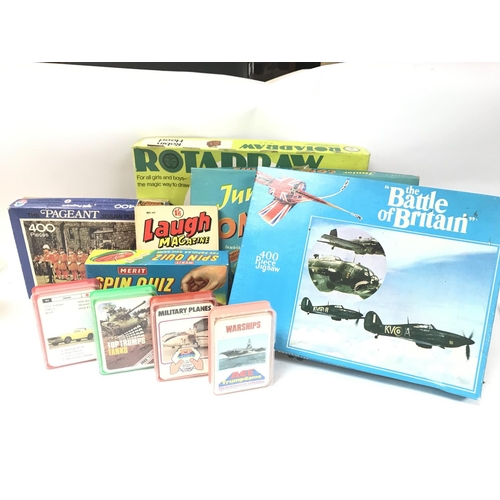 137 - A Collection of vintage games and toys including Battle of Britain jigsaw, top trumps and ace card g... 