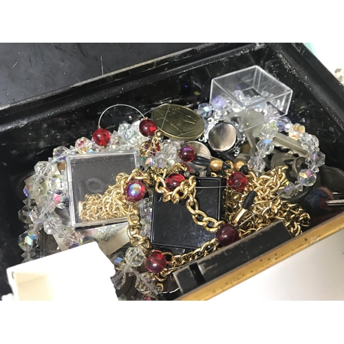 142 - Costume jewellery including necklaces, pens, coins. Postage category B