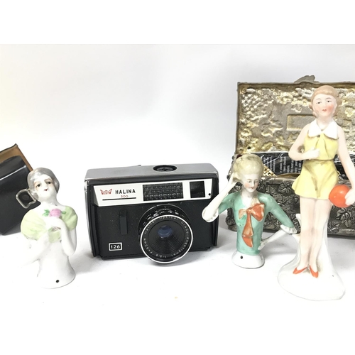 156 - A Collection of watches, a Halina 300 camera, porcelain lady figures,
