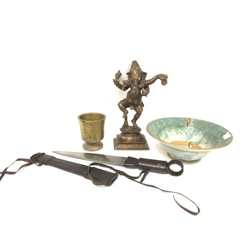 163 - A collection of items including a leather handled Durk knife, brass goblet, Dancing Ganesha figure e... 