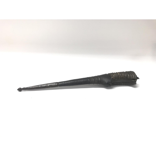 18 - An interesting 19th Century dagger possibly African with a horn handle steel blade and animal skin a... 
