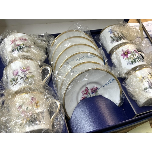 186 - Boxed Royal Worcester set including plates and cups, postage cat D
